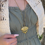Collier long sautoir élégant composé d’un pendentif œil de protection doré tendance femme 